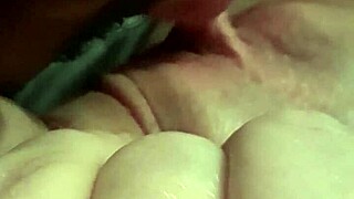 redhead milf feels excited teasing her fat pussy at home.