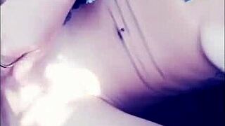 Vanessa Vixon indulges in solo fetish masturbation, playing with her big tits and pussy.