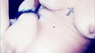 Vanessa Vixon indulges in solo fetish masturbation, playing with her big tits and pussy.