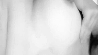 Busty milf reaches orgasm close up