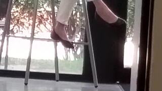 Mature Woman Engages In Shoe Play Activity