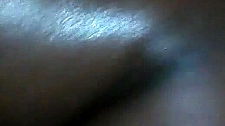 rubbing body oil on a black milf during massage