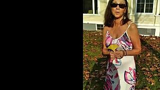 Close up of a mature woman's face while she gives a blowjob and swallows cum