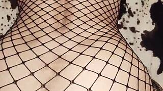 Fishnet underwear looks very exciting on her