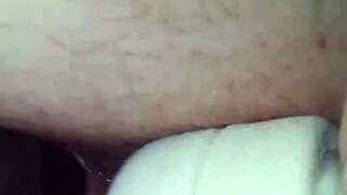 Wife takes a big black cock in her rear while using her wand toy