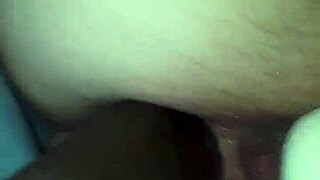 Wife takes a big black cock in her rear while using her wand toy