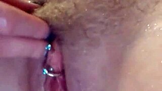 Horny milf with big tits uses toys in shower for intense blowjob action.