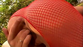 Beautiful brunette Ashley Long in red suit seduces Steve Holmes for hot sex