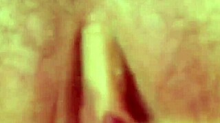 Brunette milf mom in lingerie masturbates shaved pussy on bed with fingering