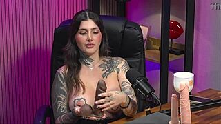 Tattooed busty babe sucks cock with fierce hunger.