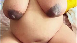 Pregnant Arab MILF enjoys solo sessions with hairy pussy
