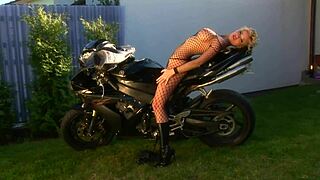 Blonde big tits milf caylan curtis boldly masturbates in fishnets