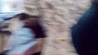 Exhibitionist couple bangs on public beach as stranger joins to finish