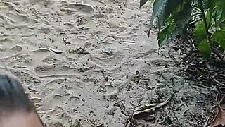 Exhibitionist couple bangs on public beach as stranger joins to finish