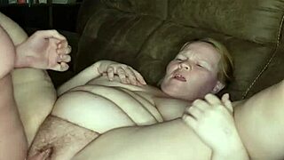 The pregnant milf, horny and wet, gets fucked on the couch