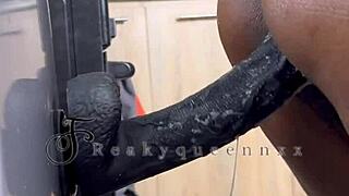 hot milf camgirl rides 14-inch dildo on fridge in kitchen video