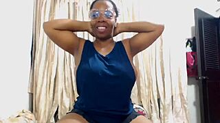 Ebony Mommy Flexes Muscular Big Tits