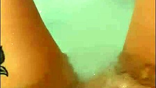 Pretty Woman Masturbates In Hot Tub