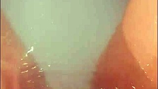 Pretty Woman Masturbates In Hot Tub