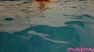 Asian milf flashes big natural tits at public pool