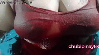 Asian milf flashes big natural tits at public pool