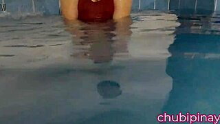 Asian milf flashes big natural tits at public pool