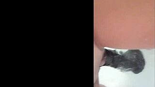 Latina milf plays with shaved pussy using nice dildo