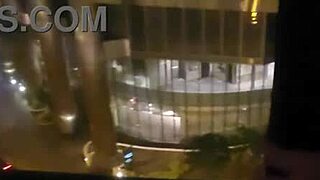 Masturbating in public by hotel window feels insanely wild!
