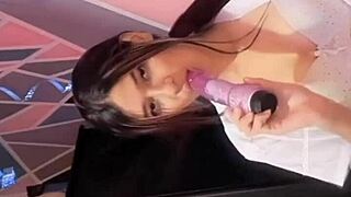 University student rocks with her dildo