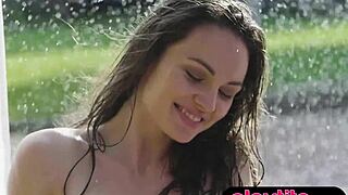 Petite Ukrainian milf bares bubble butt in rainy striptease