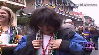 People flash at Mardi Gras party.