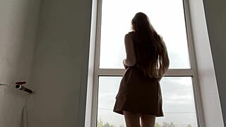 Watch Her Masturbate Publicly By The Window, Seducing Passersby!