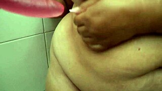 Sexy mommy masturbates huge pussy in the shower!