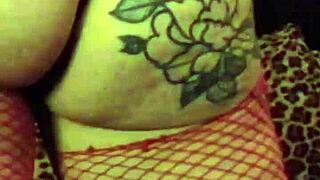 sexy milf with tattoos shakes ass outdoors in fishnets