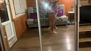 Fucking doggystyle near the mirror in close-up action