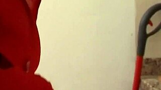 In the live erotic blowjob exchange house, a MILF masturbates while pleasuring amateurs