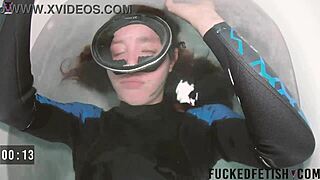 in the bathtub, a skinny girl in bikini has a sexy underwater moment