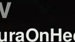 i'm sitting on the sofa in my leather miniskirt and high heels