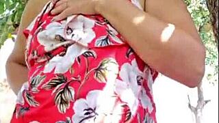 Blonde milf steps outside to masturbate and show hairy natural tits.