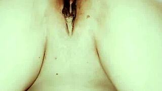 Close up view of couple in lingerie and stockings during homemade sex