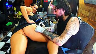 this brunette milf visits the tattoo artist