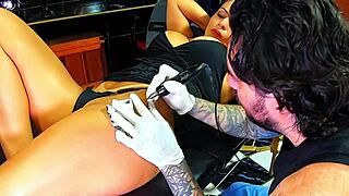 this brunette milf visits the tattoo artist