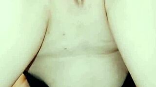 Close up view of couple in lingerie and stockings during homemade sex