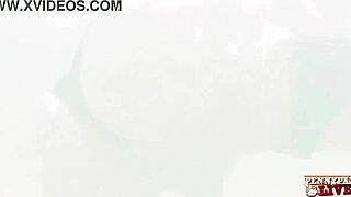 Penny Pax performs an underwater striptease and teases seductively