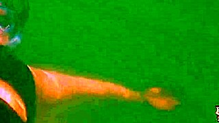 Penny Pax performs an underwater striptease and teases seductively