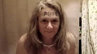 european milf slave performs humiliating striptease, flashing and ripping clothes