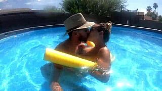 Pregnant milf enjoys pool time with neighbors watching