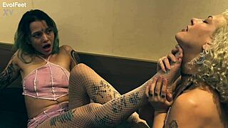 blonde goddess dominates submissive slave with bondage and foot worship