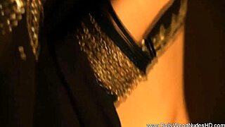 bolly babe stripping naked, teasing sensually as a horny milf