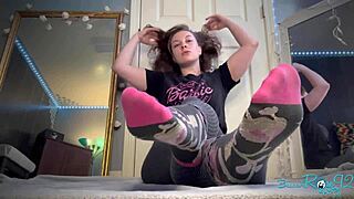 Housewife with tattoos strips barefoot in socks